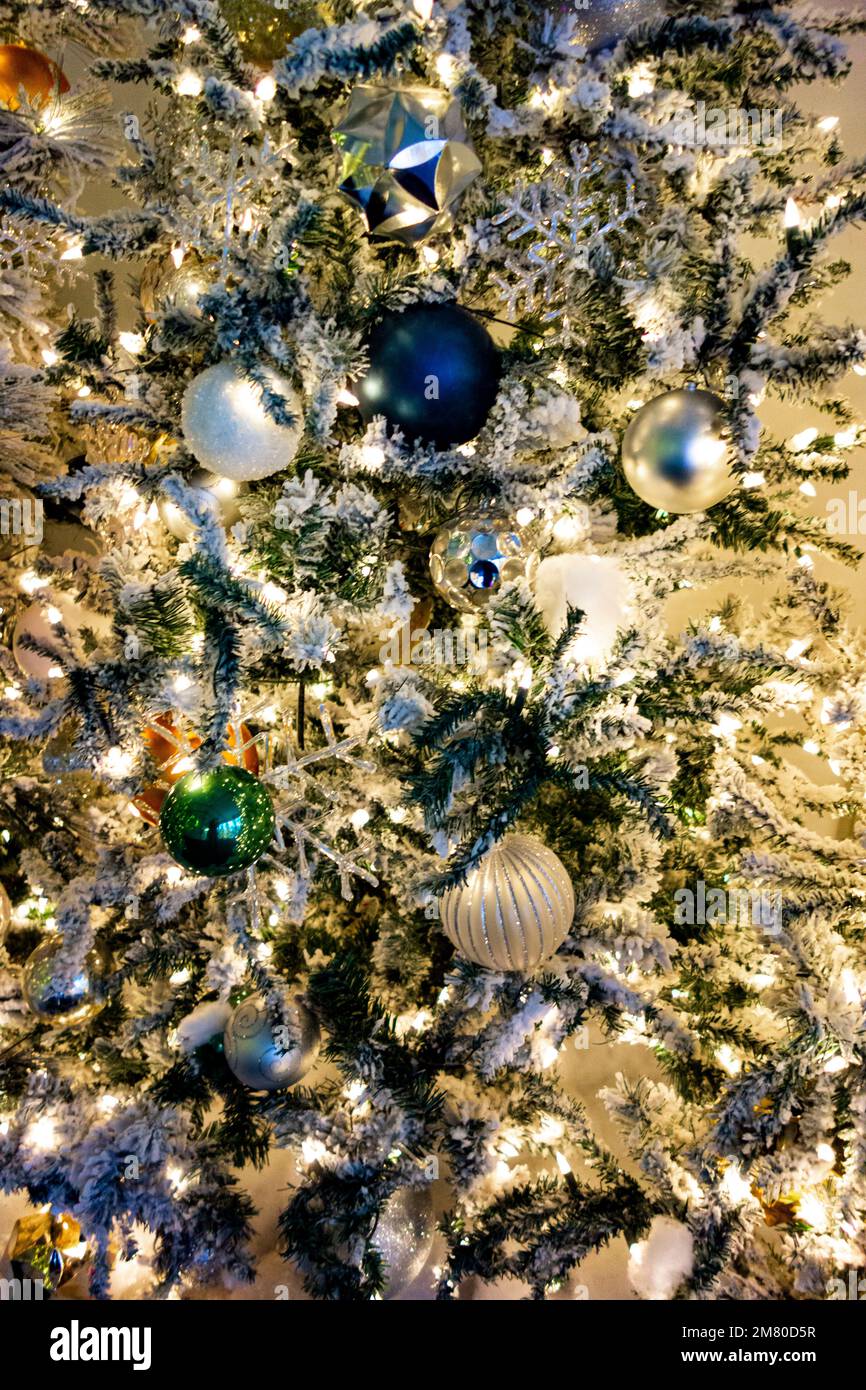 Decorations on a festive Christmas tree Stock Photo