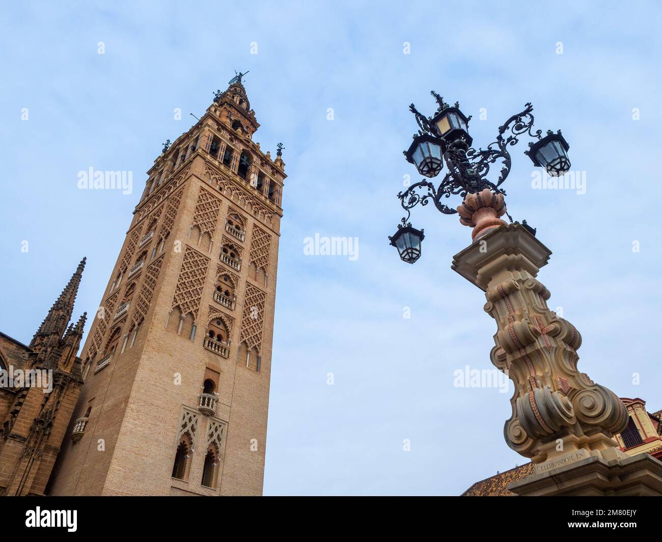 View of the famous Giralda of the cathedral of Seville. Stock Photo