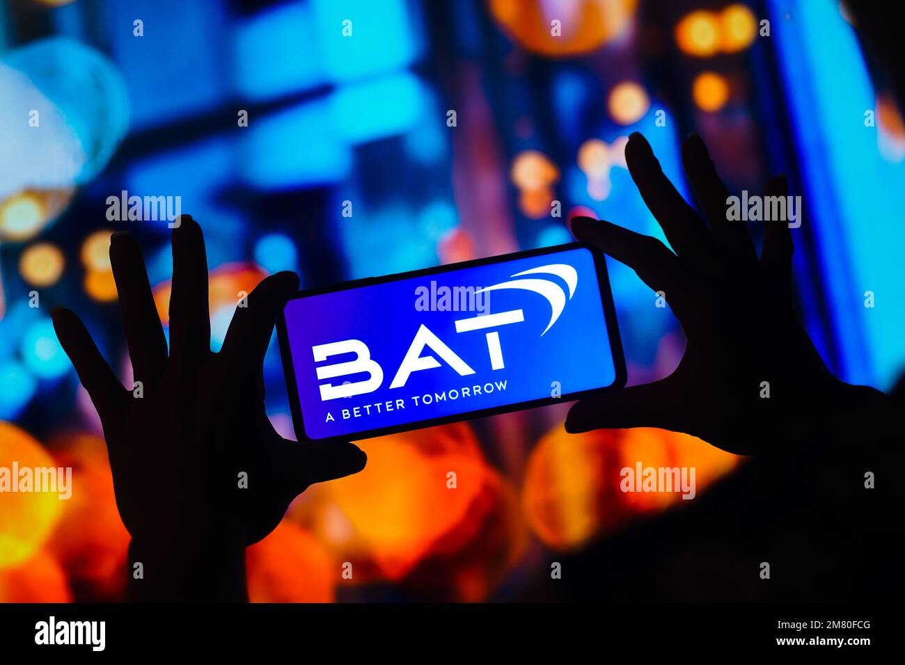 In this photo illustration, the British American Tobacco (BAT) logo is displayed on a smartphone screen. Stock Photo