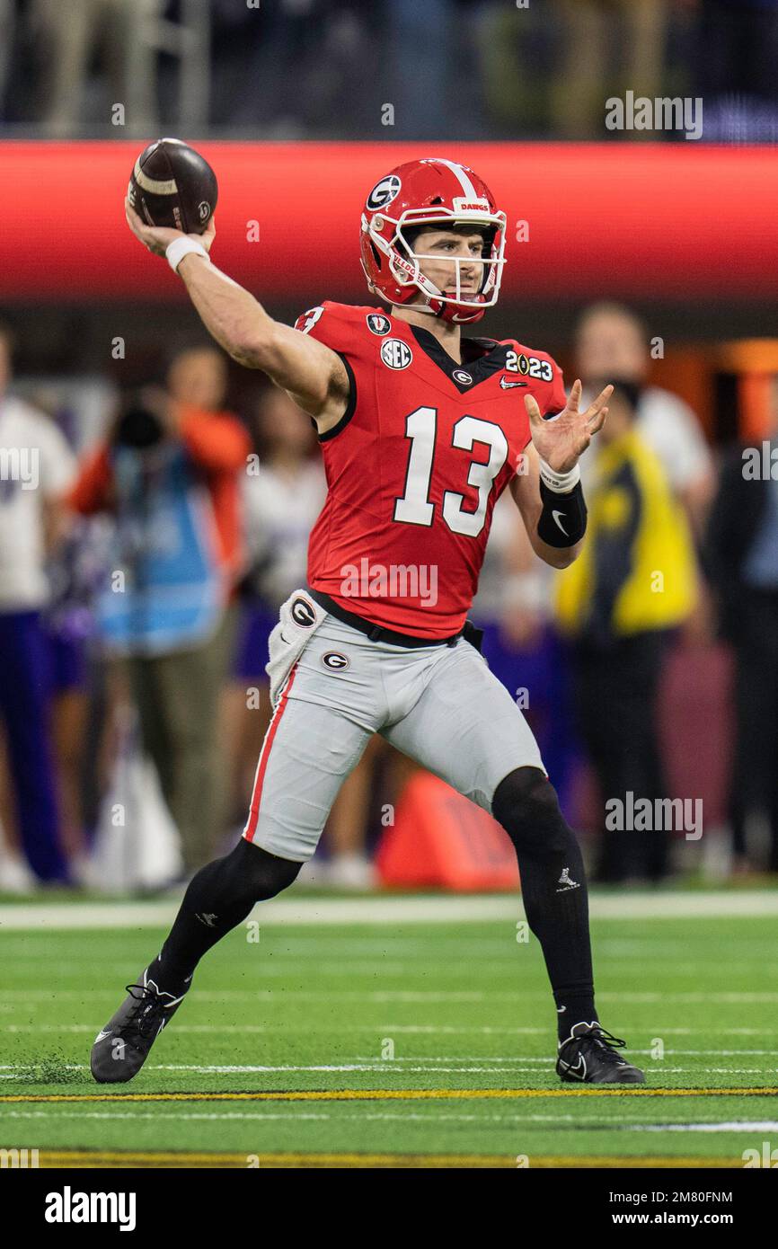 Bulldogs quarterback Stetson (13) throws a pass during