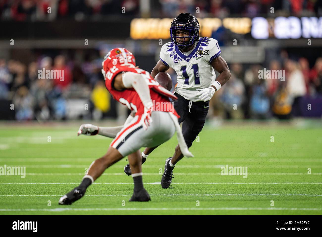 TCU Horned Frogs wide receiver Derius Davis (11) runs the ball after a catch against Georgia Bulldogs defensive back Javon Bullard (22) during the Col Stock Photo