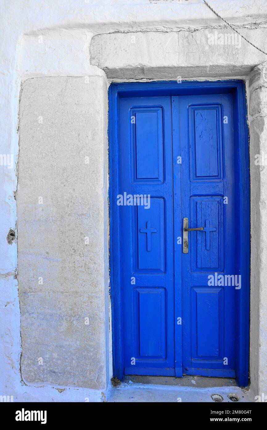 Blue door in a greek village Stock Photo - Alamy