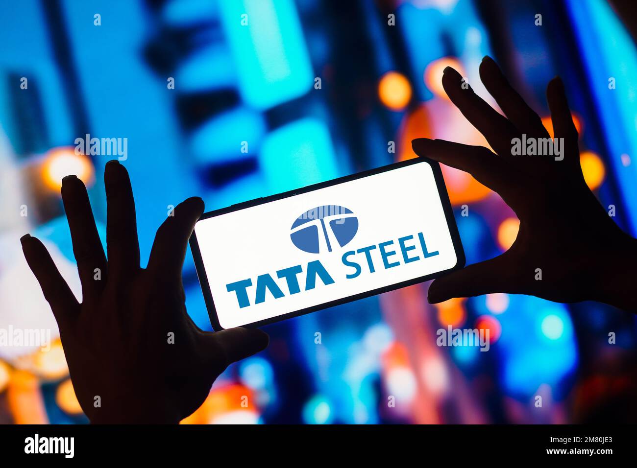 In this photo illustration, the Tata Steel logo is displayed on a