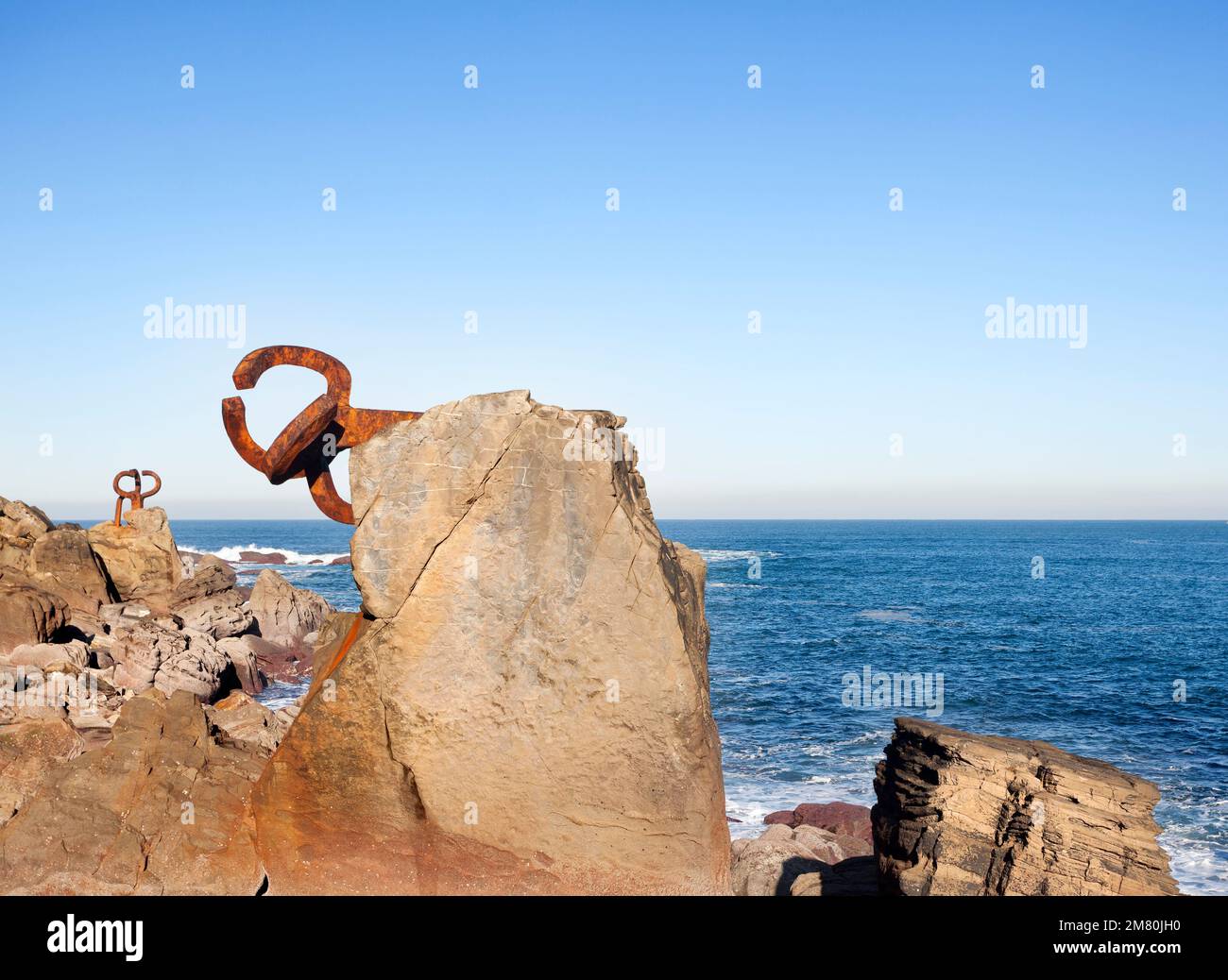 Donosti, Spain-December 22, 2014: On sunny days,in the end of the la Concha beach you can see Chillida's sculptures Stock Photo