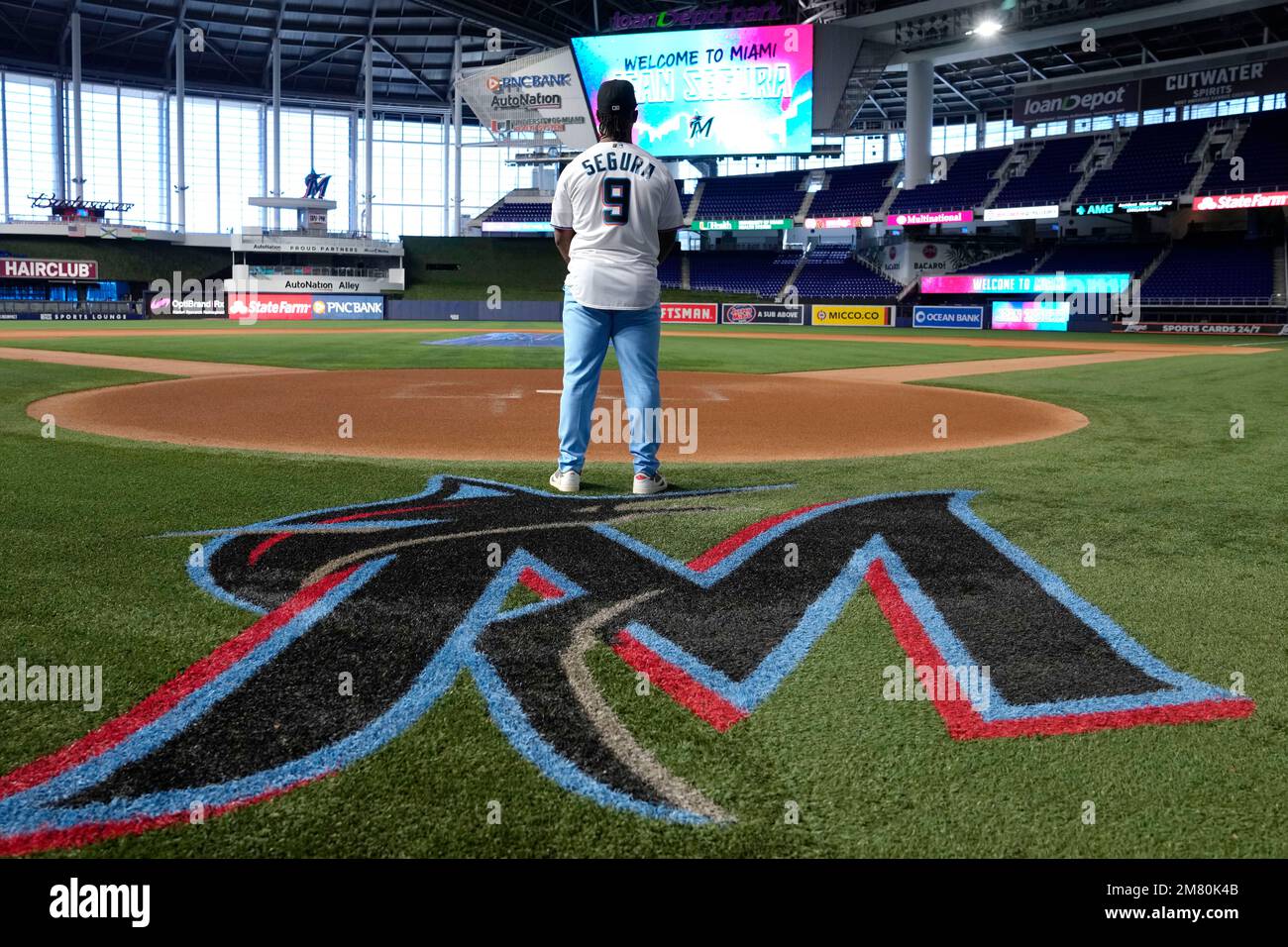 Miami Marlins baseball infielder Jean Segura wears a Marlins