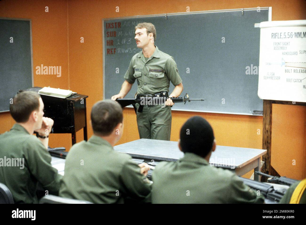 Members of the 90th Security Police Group listen to a classroom lecture on the M16A1 rifle. Base: Francis E. Warren Air Force Base State: Wyoming (WY) Country: United States Of America (USA) Stock Photo