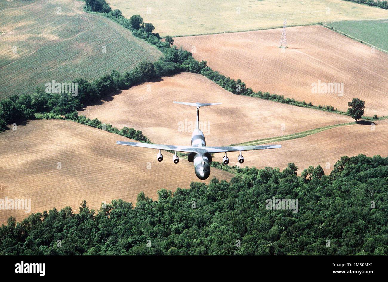 An air-to-air front view of a C-141B Starlifter aircraft on a Special ...