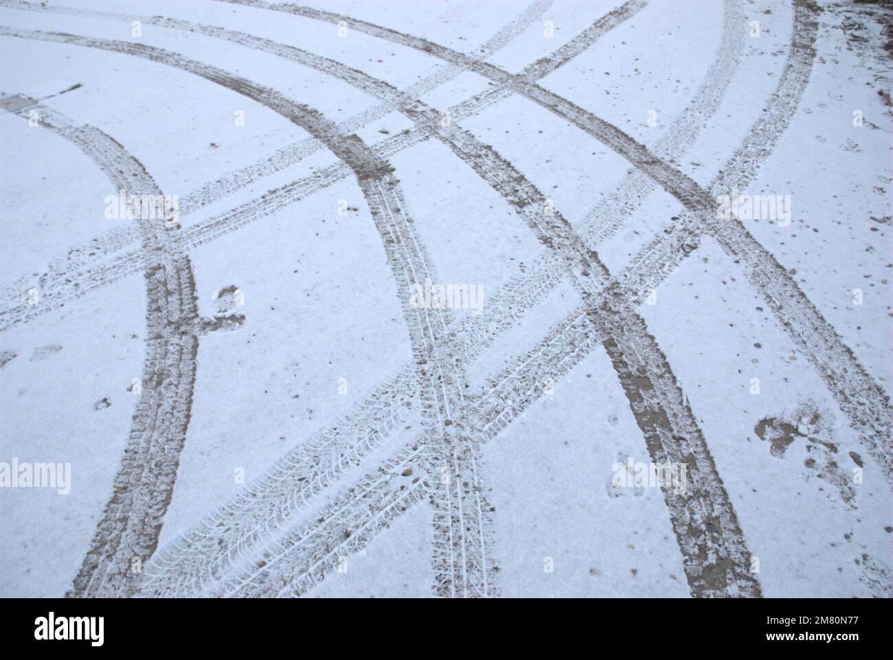 Tire tracks in the snow Stock Photo