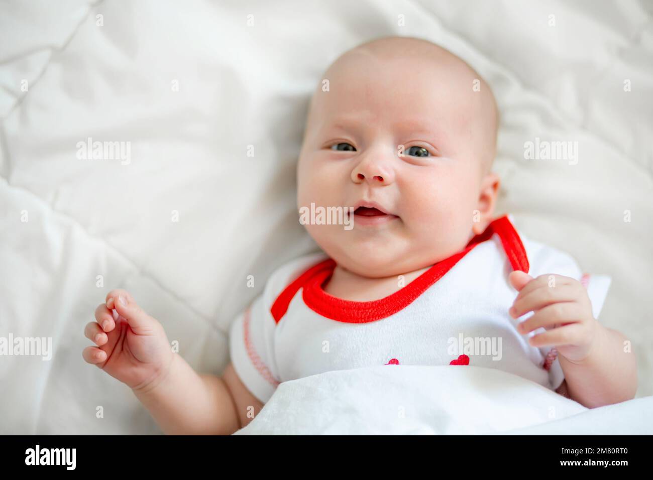 The little baby sleeps folding its legs one on top of the other. Small