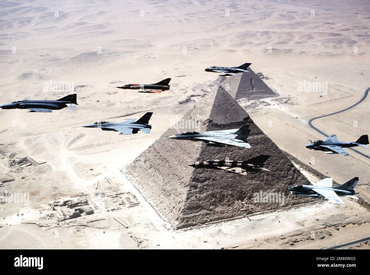 An air-to-air left side view of US and Egyptian aircraft as they