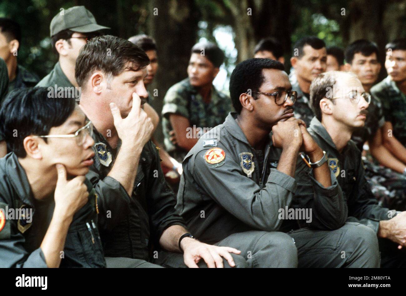 United States Air Force personnel listen to a lecture on identification