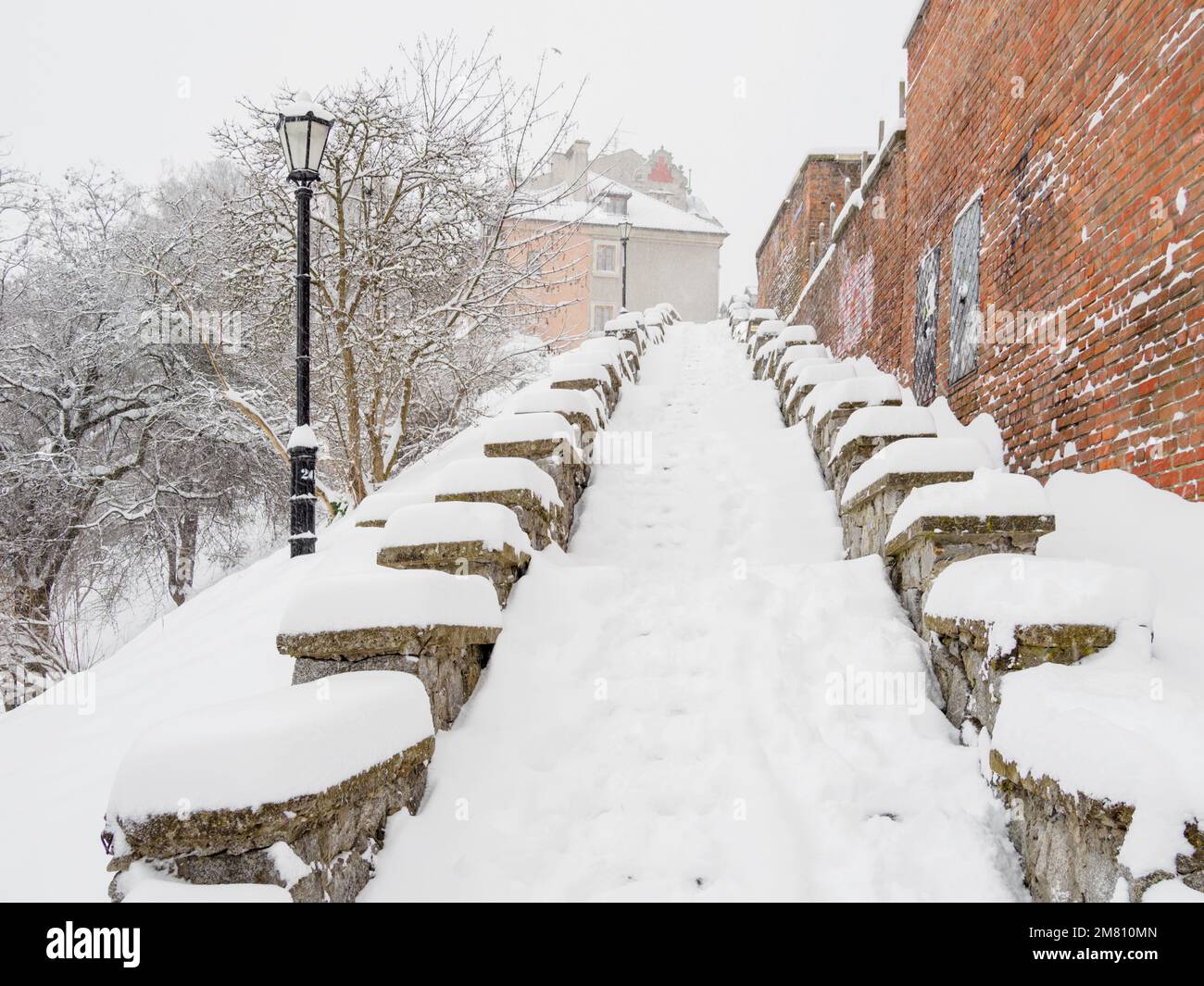 Snow-covered stairs. Old Town in Lublin. Stock Photo