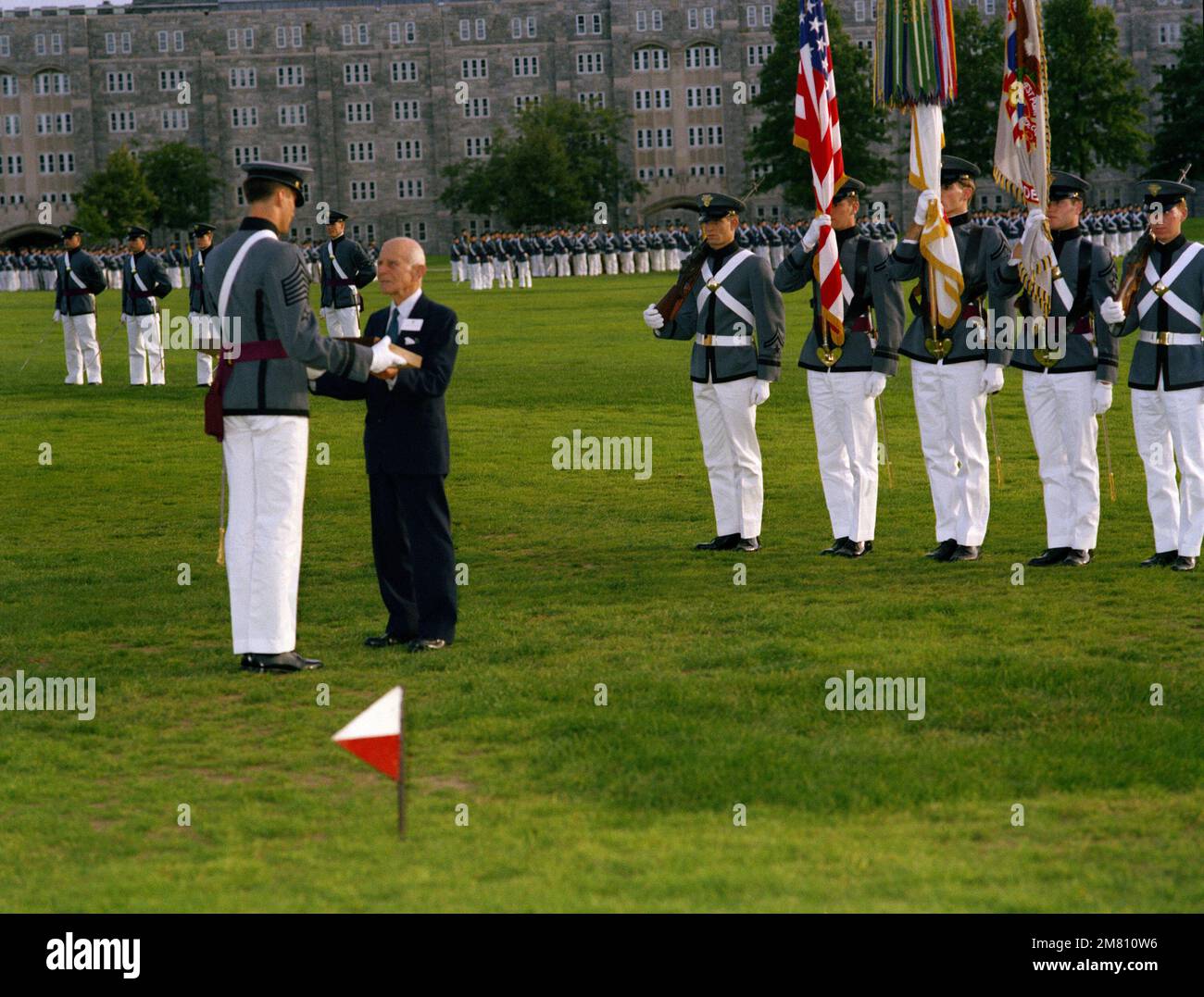 Cadet 1ST Captain William Rapp presents a saber to Thayer Award winner US Air Force retired Lieutenant General James Doolittle during a ceremony at the US Military Academy. Base: West Point State: New York (NY) Country: United States Of America (USA) Stock Photo