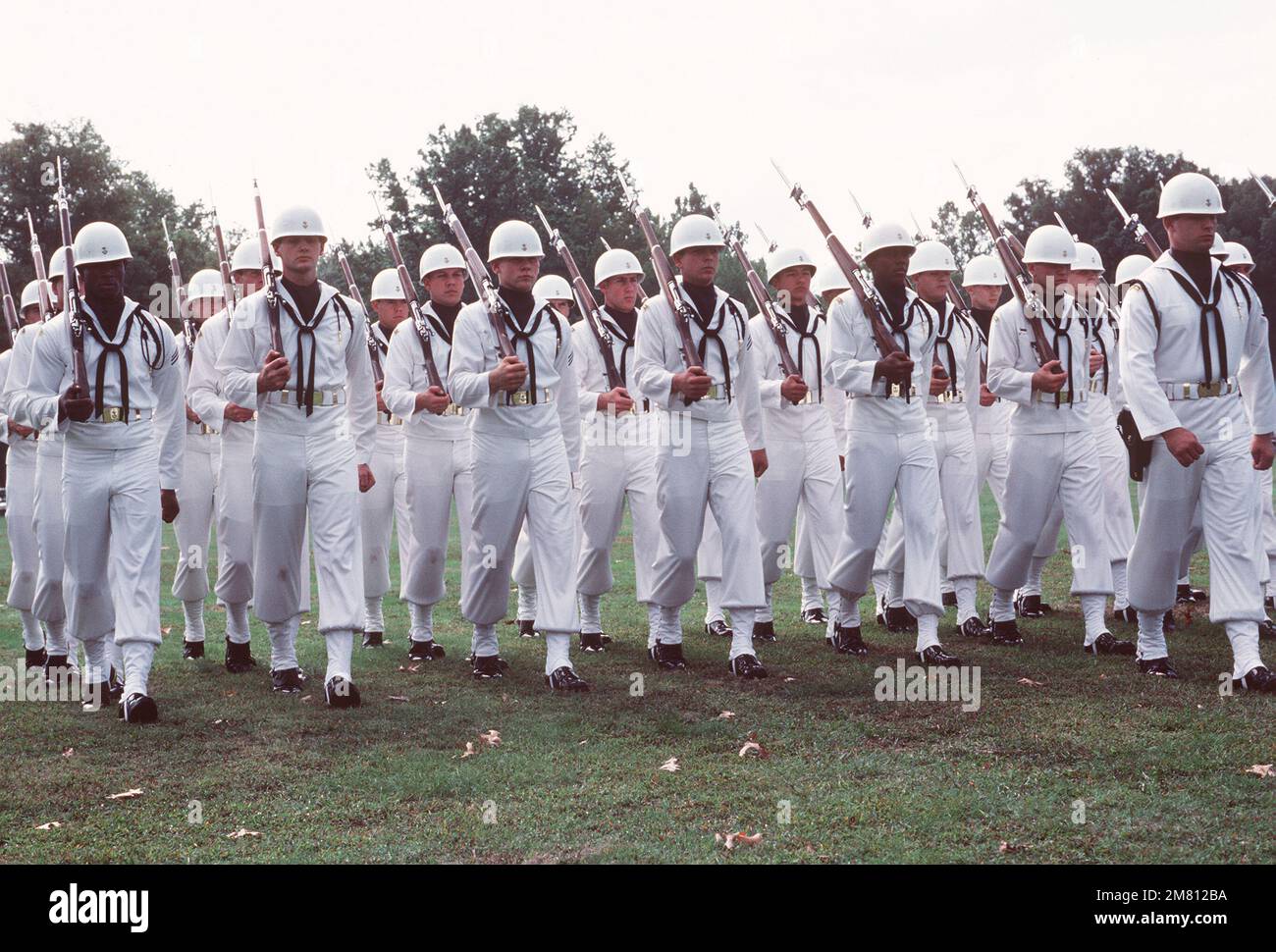 The Navy Drill Team performs during the commissioning ceremony for the