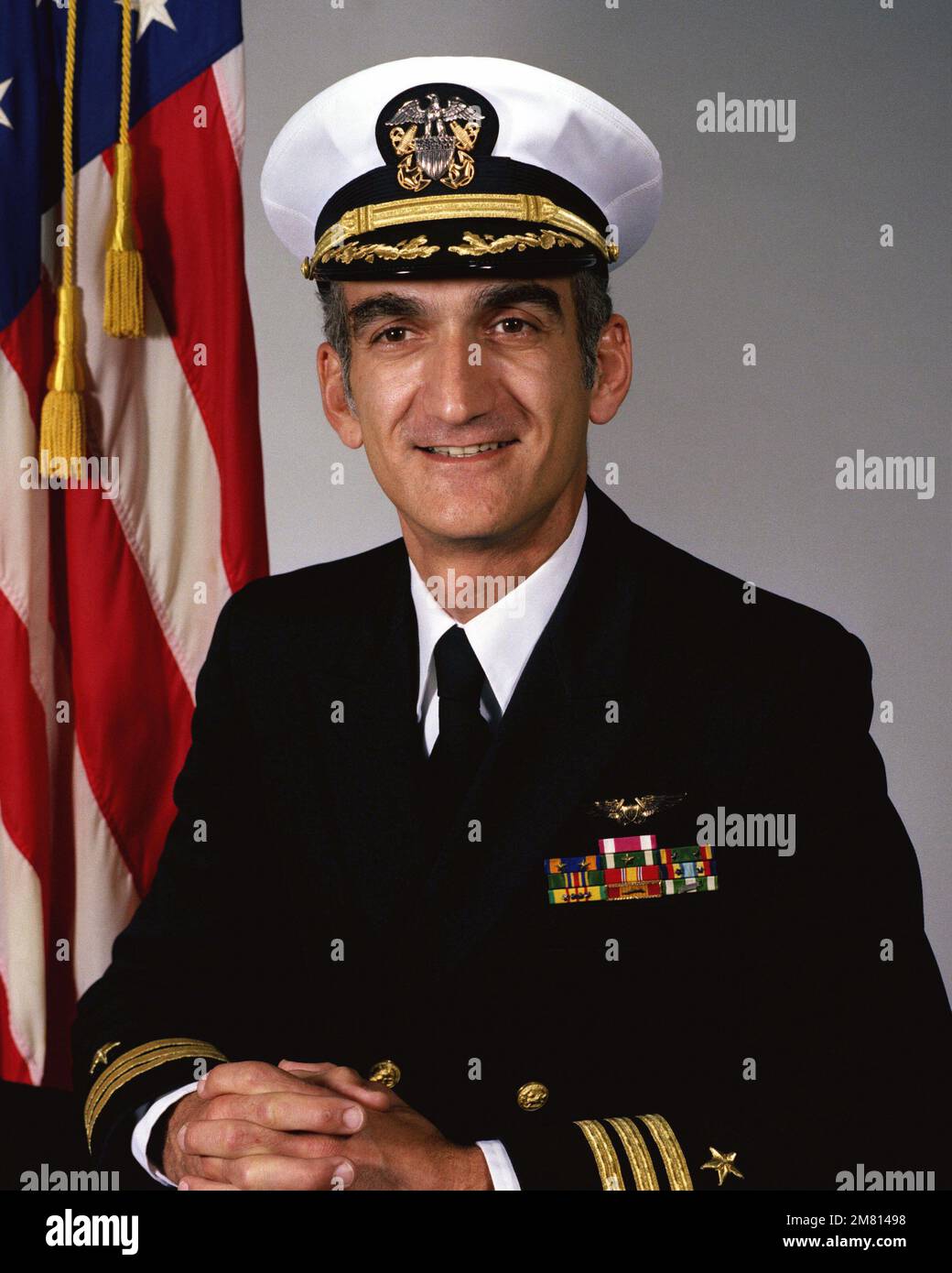 Commander Kenneth F. Leon, USN (covered). Country: Unknown Stock Photo