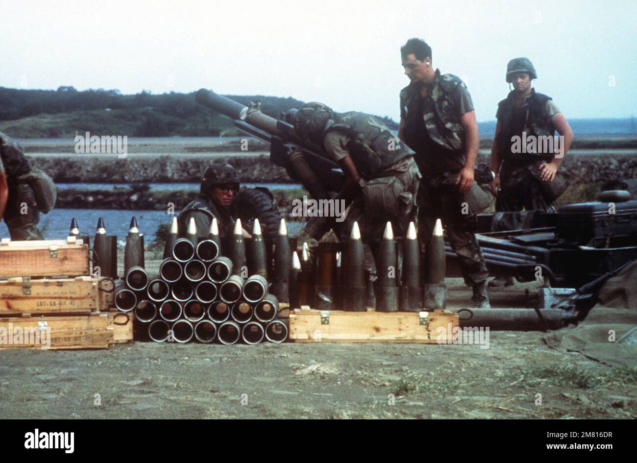 82nd Airborne Division artillerymen prepare projectiles for their M102