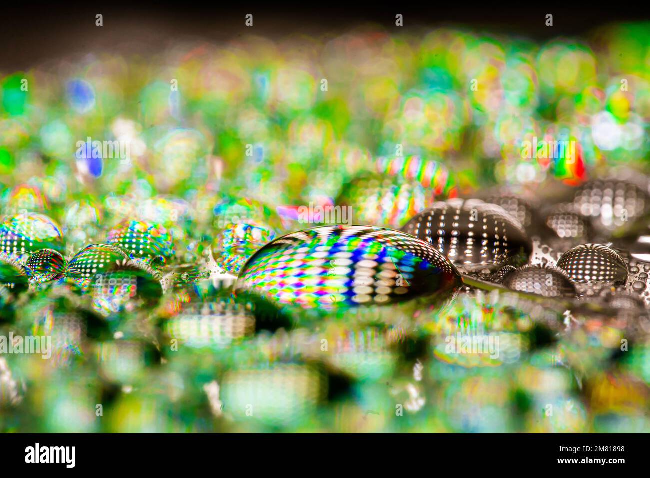 A colorful water drops surface background Stock Photo - Alamy