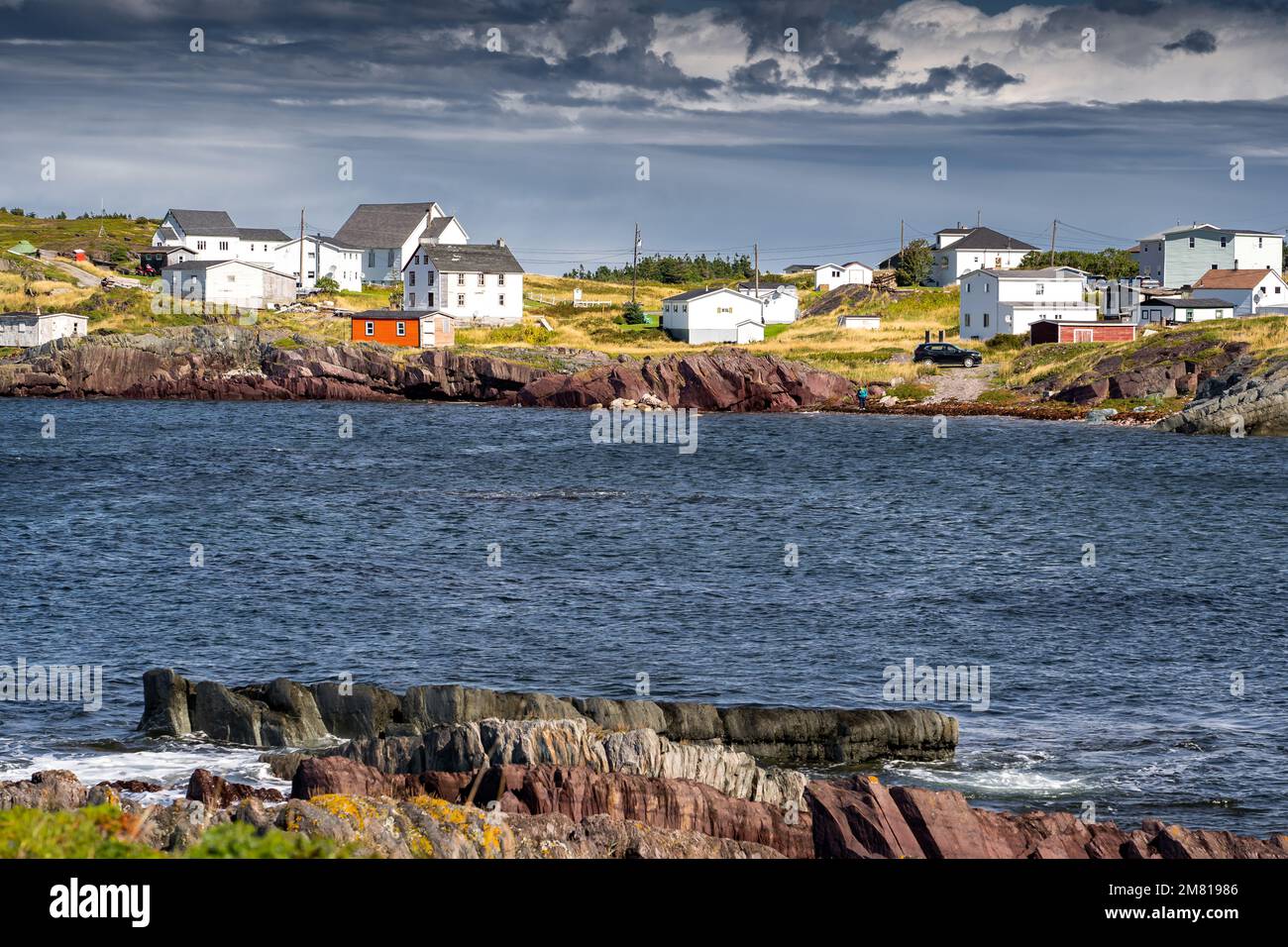 Maritime homes built on rocky cliffs in a small fishing community