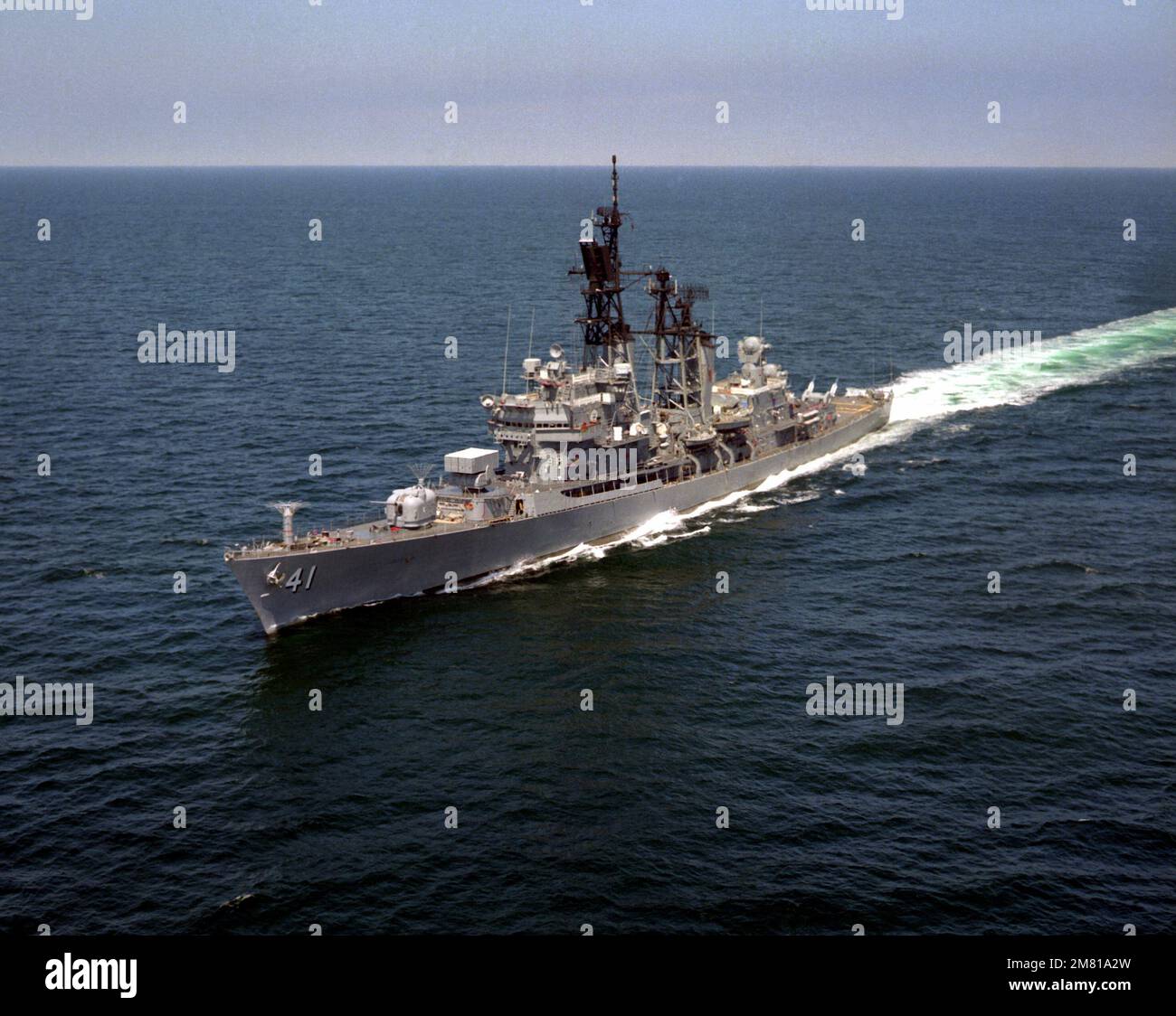 A port bow view of the guided missile destroyer USS KING (DDG-41) underway. Country: Unknown Stock Photo