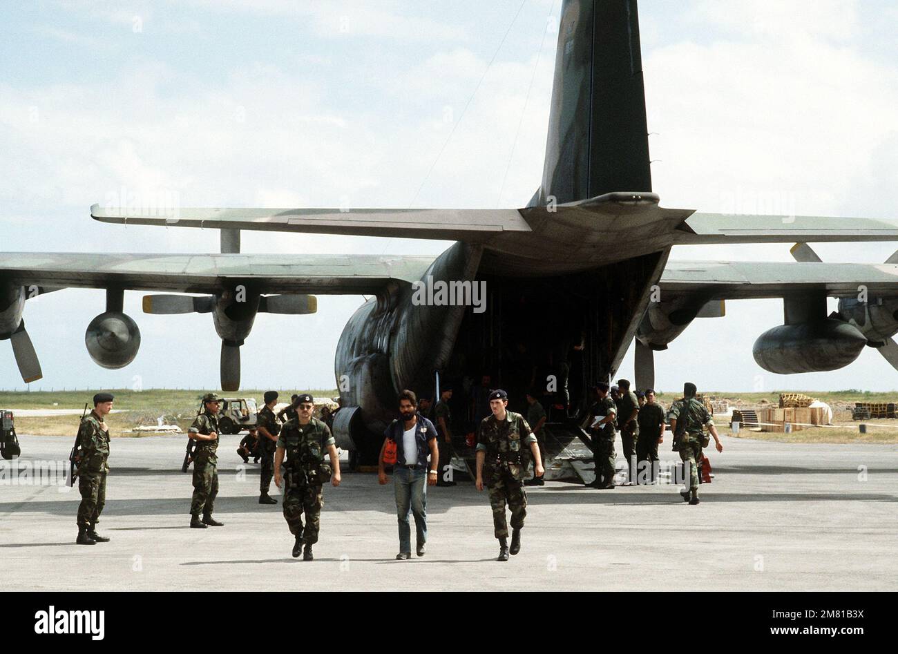 U s air force security police stand guard as a cuban national