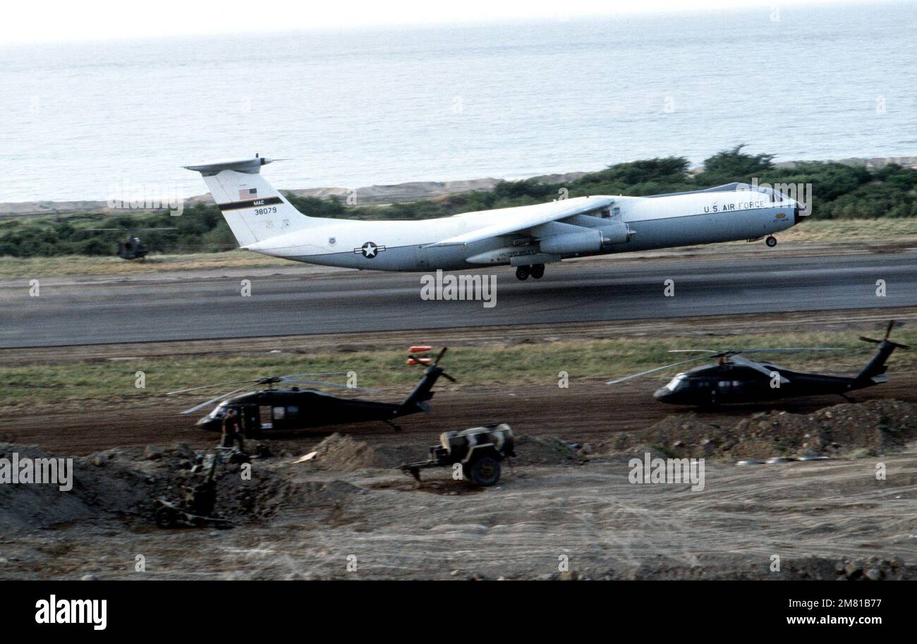 A US Air Force C-141B Starlifter aircraft takes off from Point Salines ...
