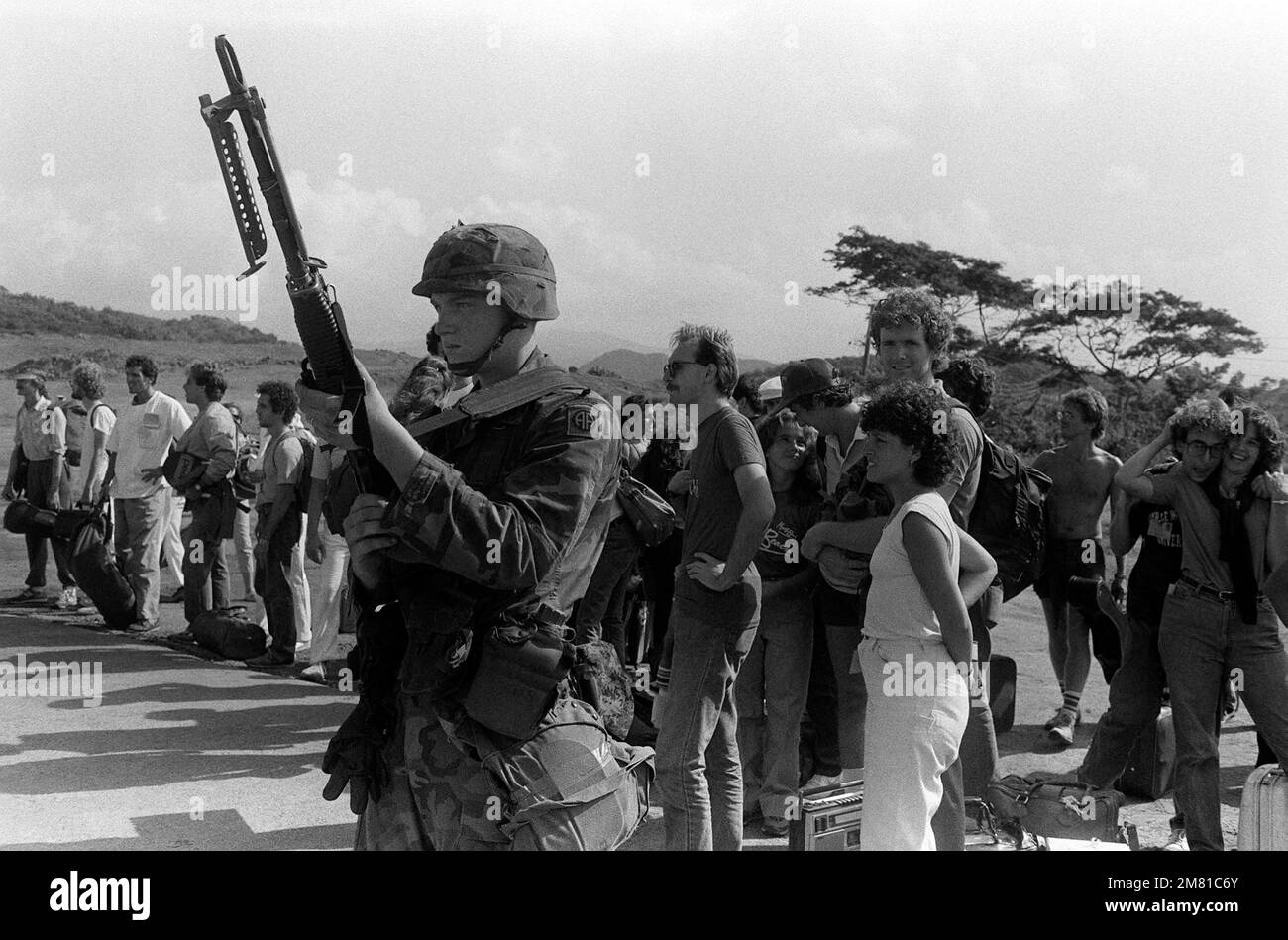 A member of the 82nd airborne division armed with an m60 machine gun