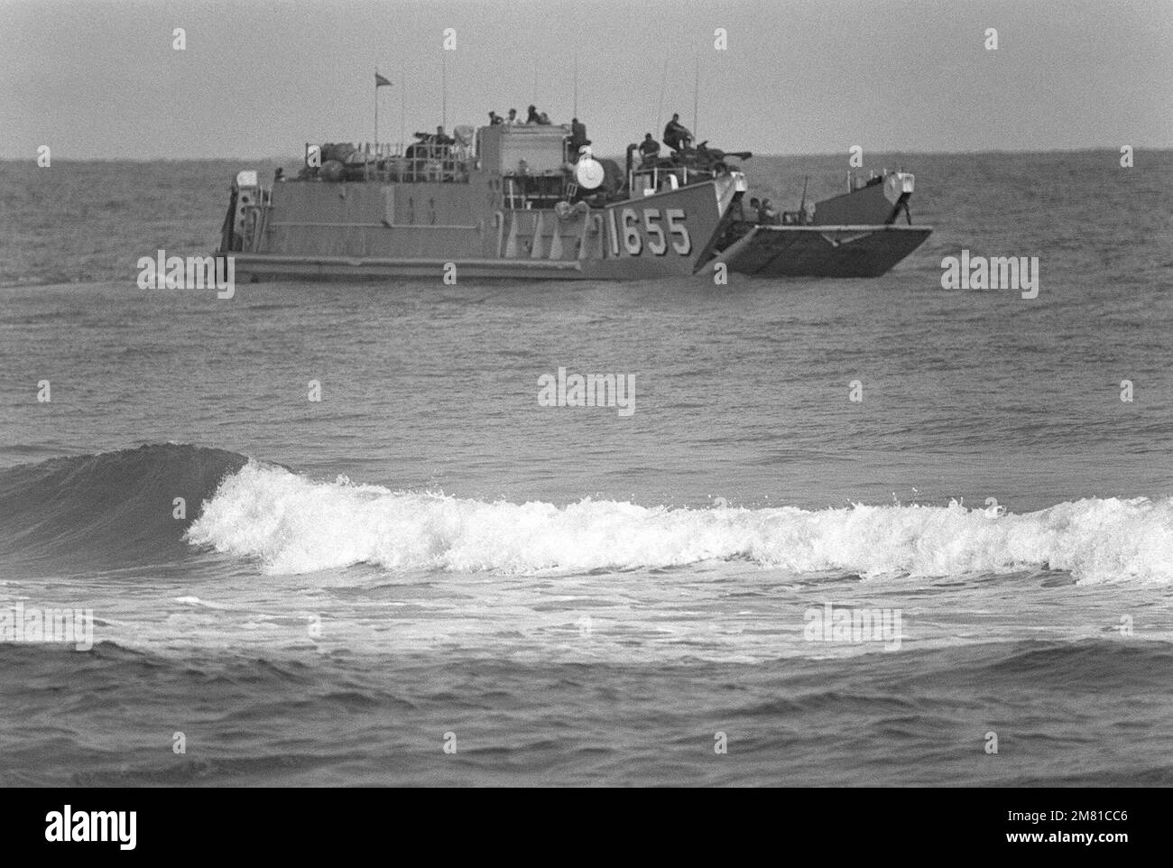 A utility landing craft (LCU 1655) approaches the beach as an assault takes place during the AHUAS TARA II (BIG PINE) operation. Subject Operation/Series: AHUAS TARA II (BIG PINE) Base: Puerto Castilla Country: Honduras (HND) Stock Photo