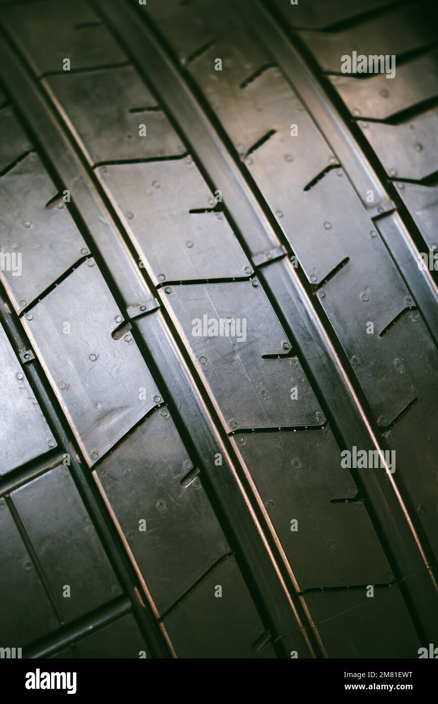 Close up full frame shot of a new street tire thread. Stock Photo