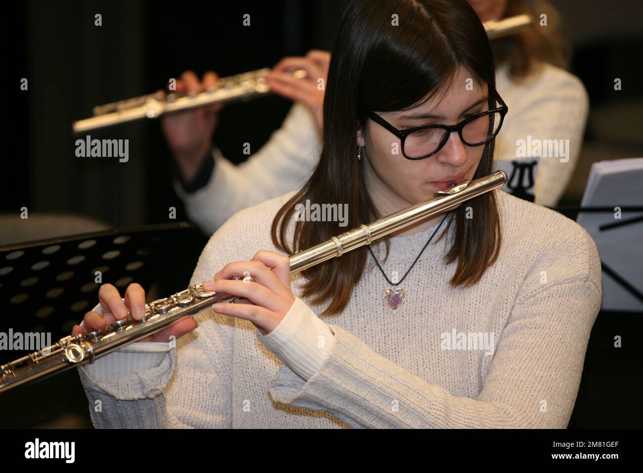A flautist playing a rehearsal piece for CoMA (Contemporary Music for