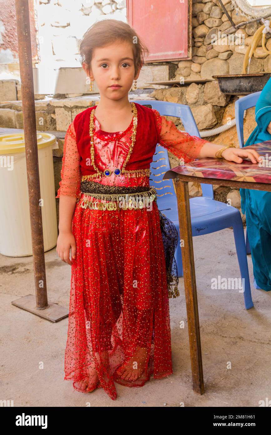 PALANGAN, IRAN - JULY 12, 2019: Girl wearing a traditional Kurdish dress in Palangan village in Kurdistan region, Iran Stock Photo