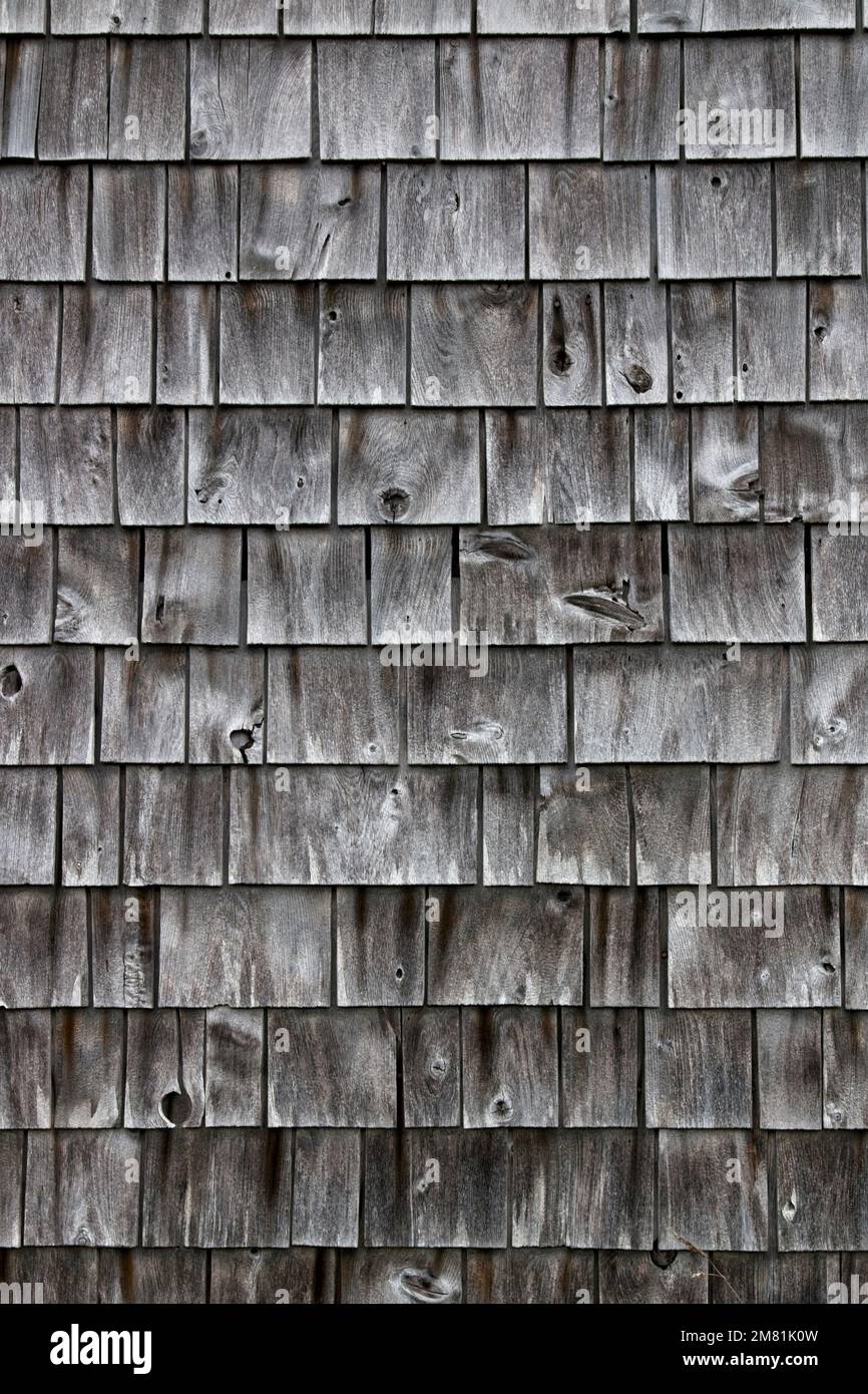 A portion of old weathered board siding on a shack. Sandy Cove, Nova Scotia. Stock Photo