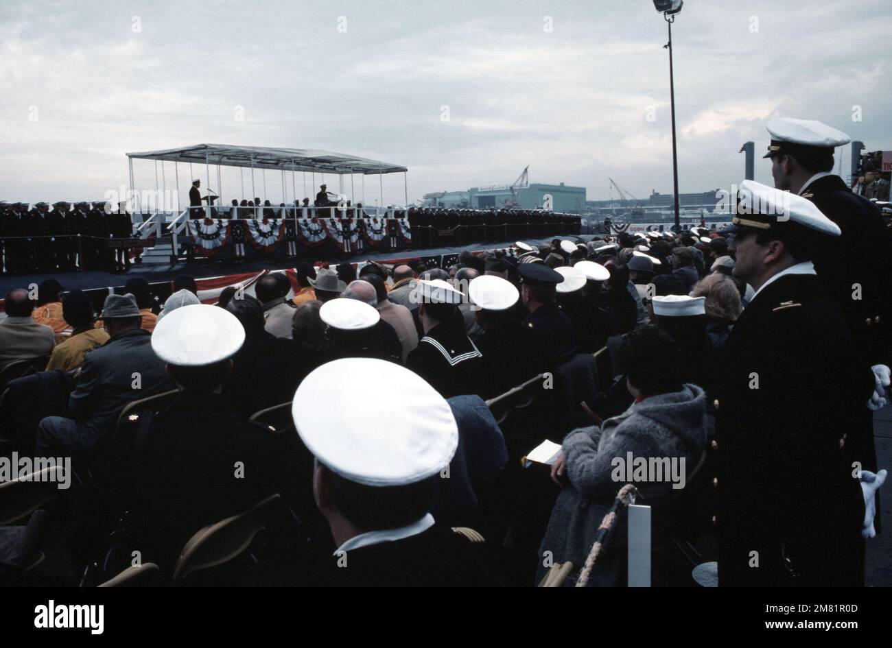 a-view-of-the-seated-guests-facing-the-speakers-platform-during-the