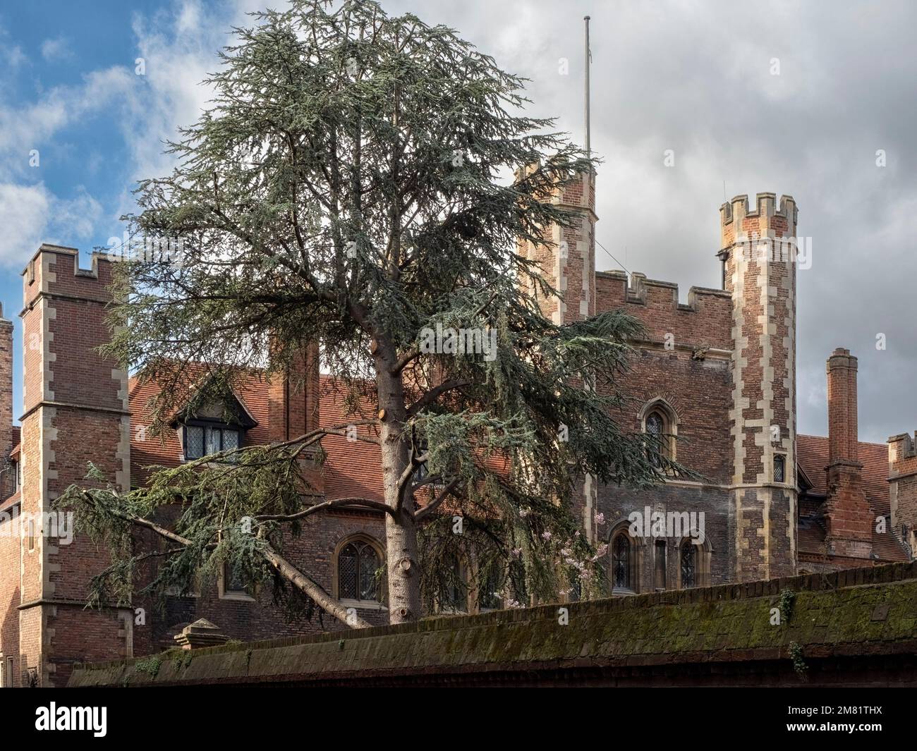 CAMBRIDGE, UK - MARCH 11, 2020:  Exterior view of Queens' College gatehouse in spring Stock Photo