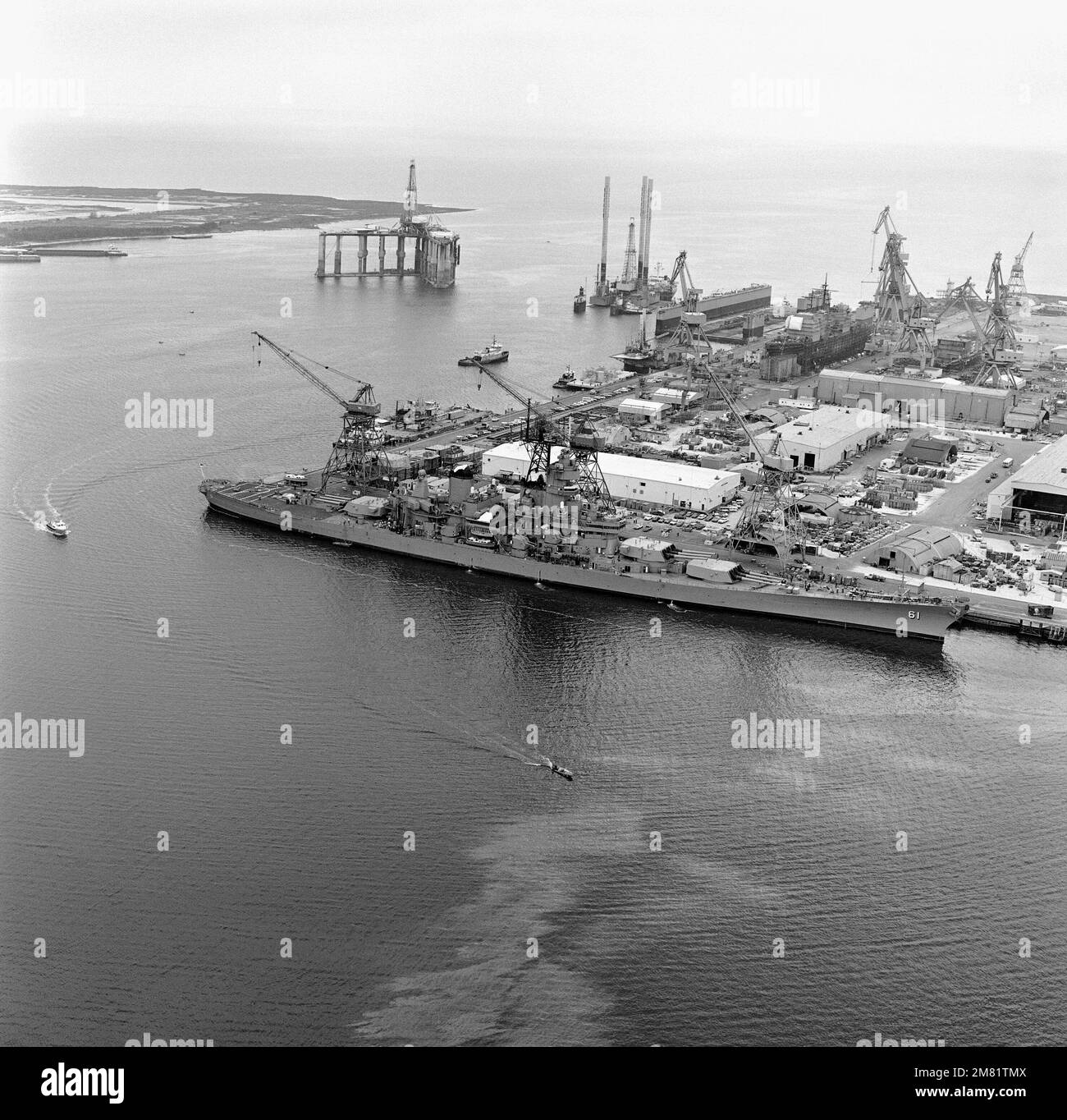 An elevated starboard bow view of the battleship USS IOWA (BB 61