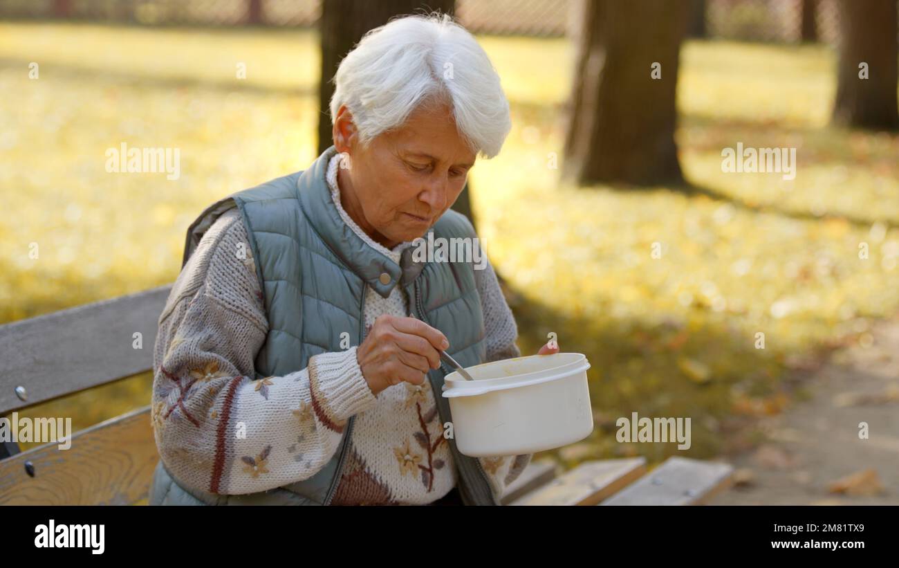 Grey haired woman and food hi-res stock photography and images - Alamy