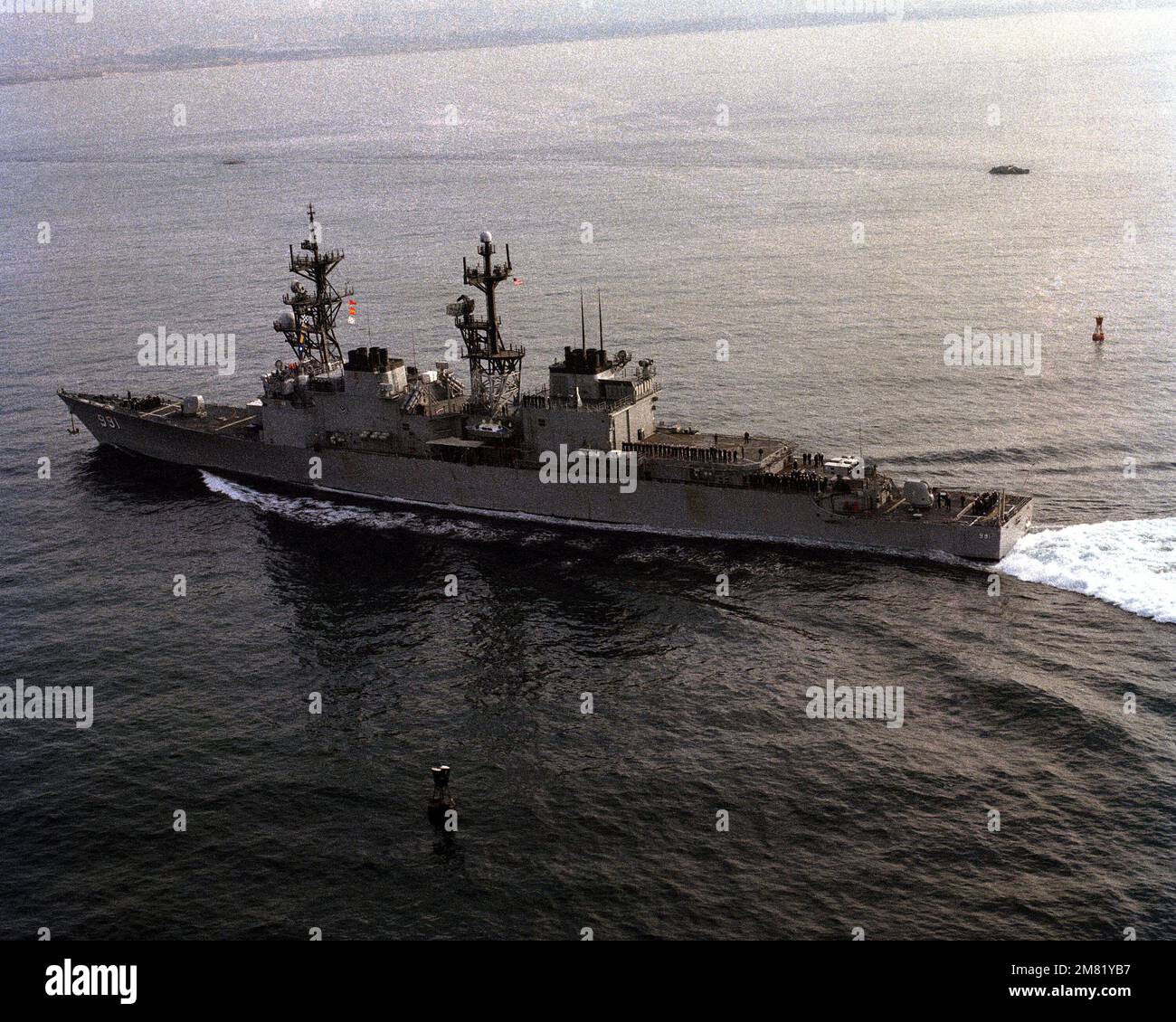 An aerial port quarter view of the destroyer USS FIFE (DD 991