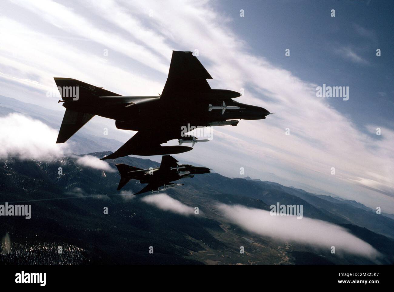 F-4G Phantom fighter aircraft from the 35th Tactical Fighter Wing, Tactical  Air Command, fly over the coastline of Bahrain during Operation Desert  Shield. The aircraft are armed with AGM-88 high-speed, anti-radiation,  air-to-surface