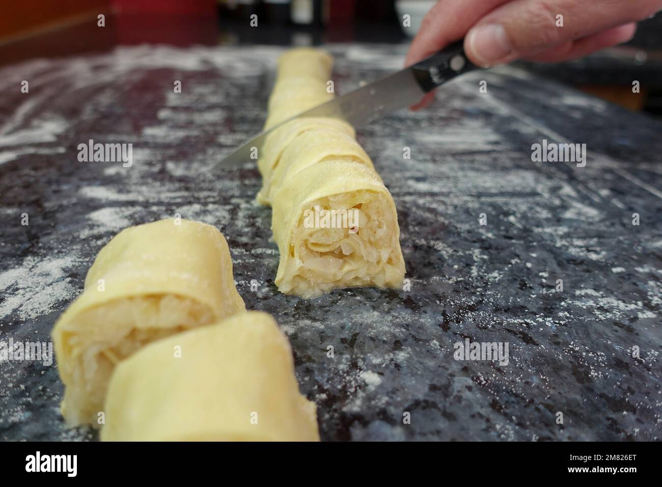 Swabian cuisine, preparation of Krautkrapfen, flour sacks, sauerkraut ...