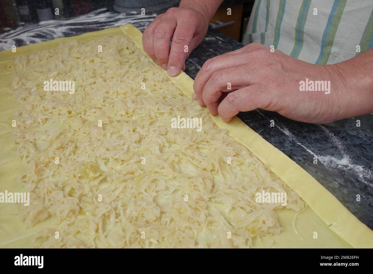 Swabian cuisine, preparation of Krautkrapfen, flour sacks, spreading ...