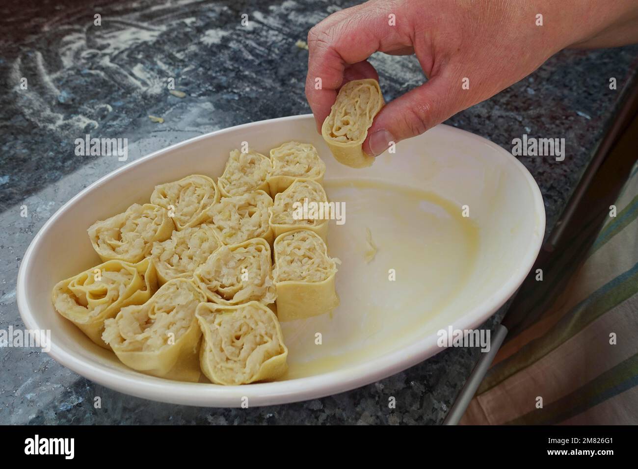 Swabian cuisine, preparation of Krautkrapfen, flour sacks, sauerkraut ...