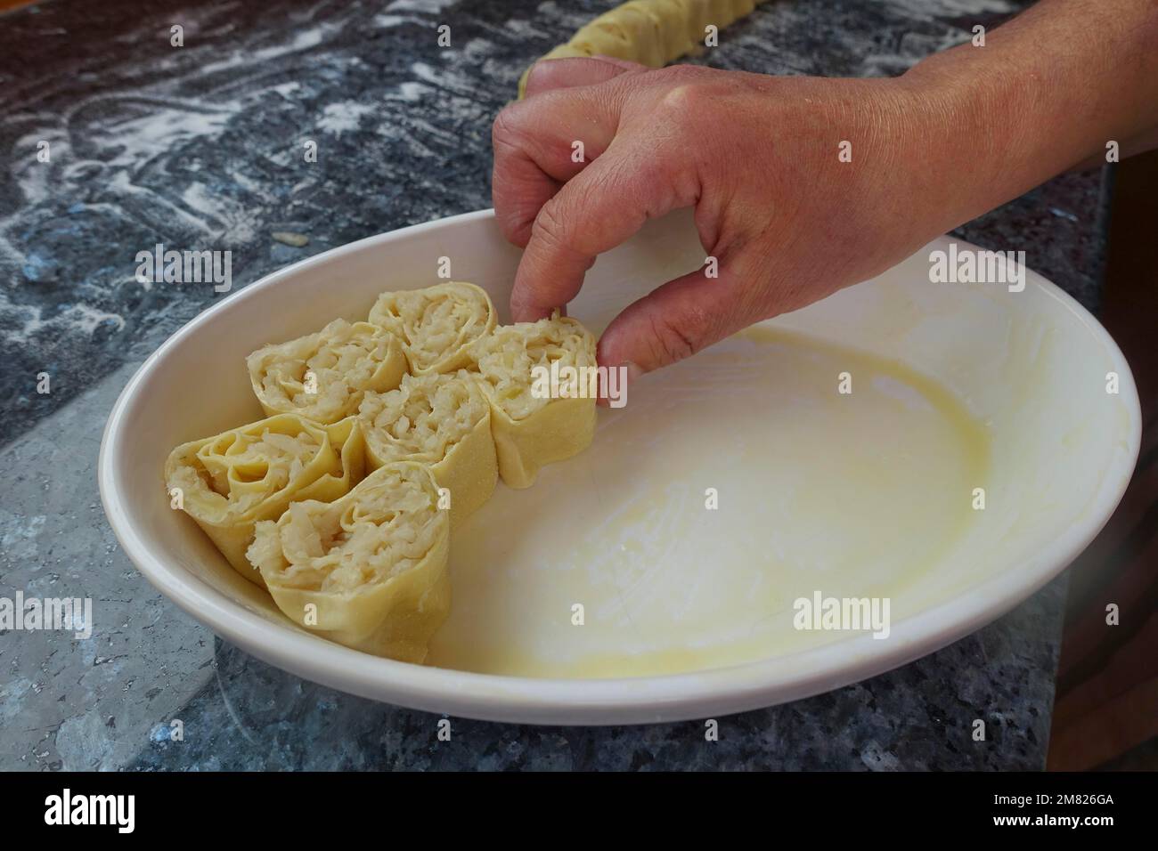 Swabian cuisine, preparation of Krautkrapfen, flour sacks, sauerkraut ...