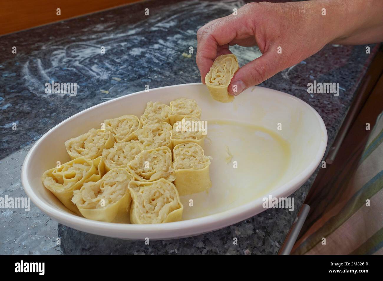Swabian cuisine, preparation of Krautkrapfen, flour sacks, sauerkraut ...