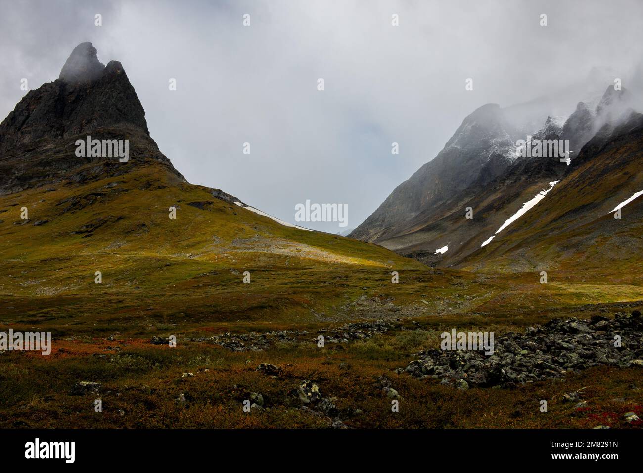 Nallo mountain massif on a moody rainy day in September, Lapland, Sweden Stock Photo