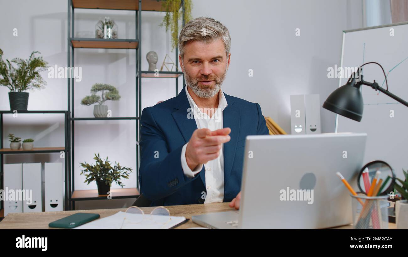 I choose you. Middle aged businessman programmer software developer ...