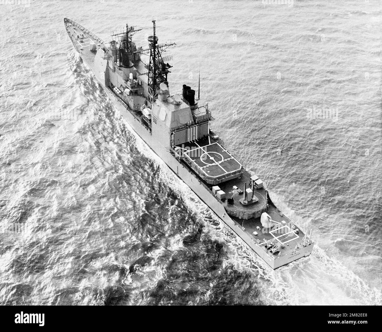 An elevated port quarter view of the Aegis guided missile cruiser USS