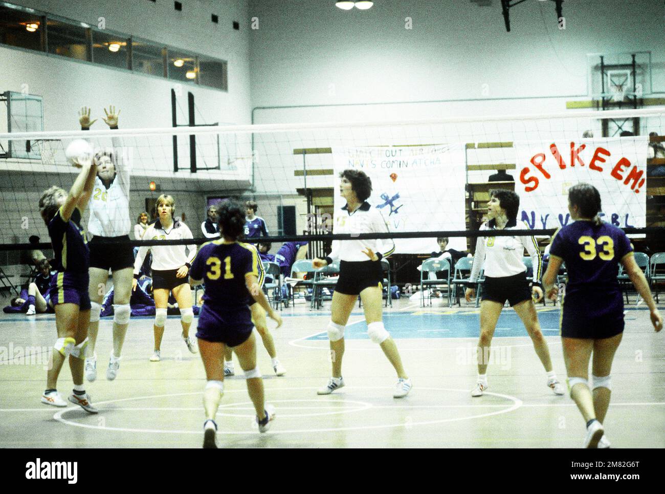 The U. S. Naval Academy women's volleyball team plays a game in