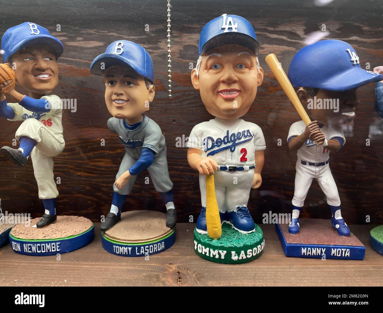 Shelf with bobblehead dolls of Dodgers players on display at Philippe