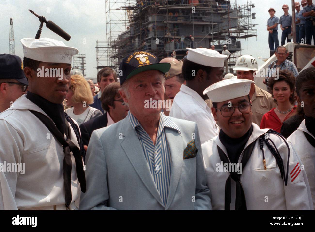 Bob Hope meets with sailors after a 30-minute show with actress Ann Jillian on board the aircraft carrier USS FORRESTAL (CV-59). Base: Philadelphia State: Pennsylvania (PA) Country: United States Of America (USA) Stock Photo