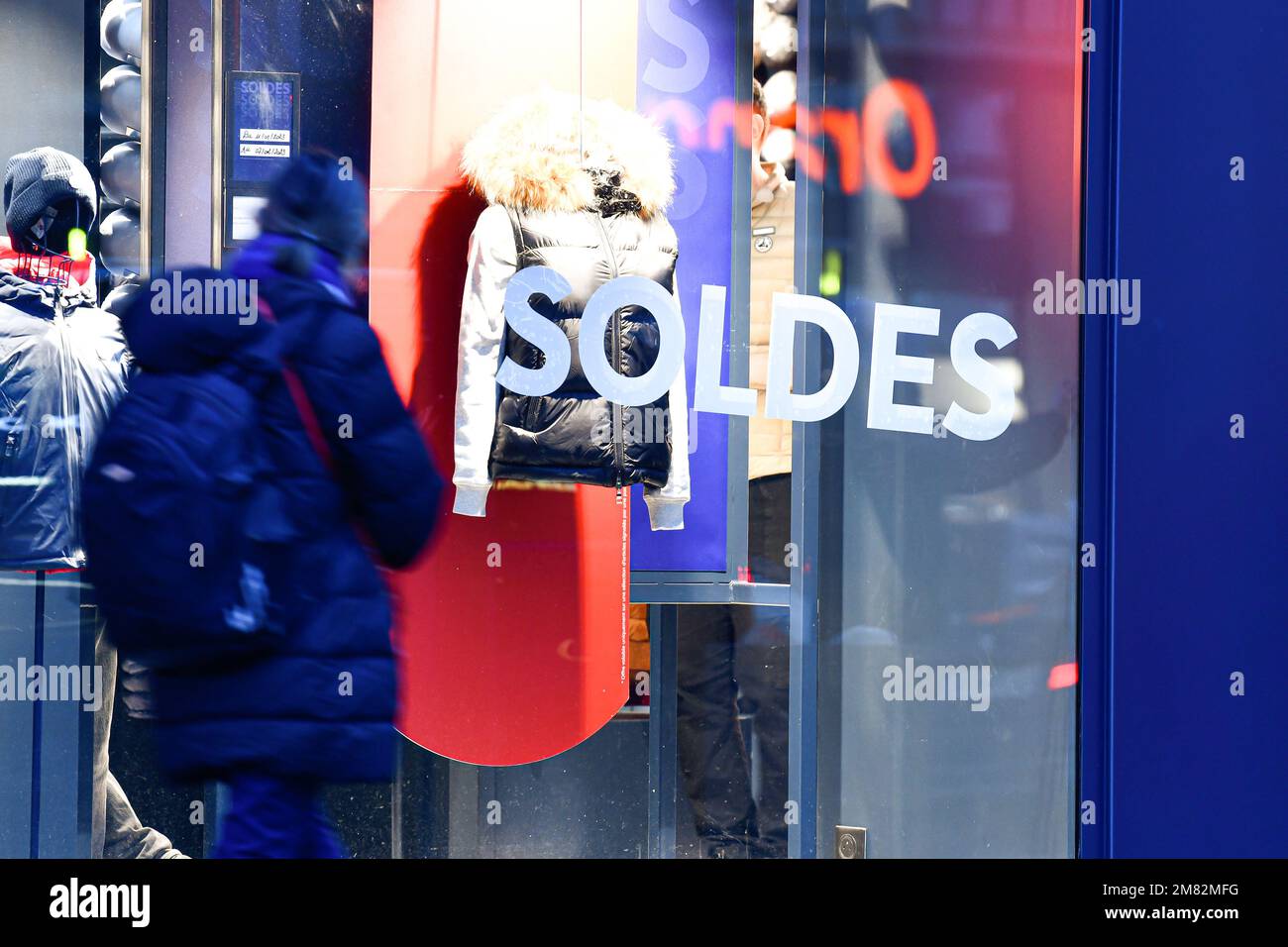 Posters in various French stores, start of the shopping season with