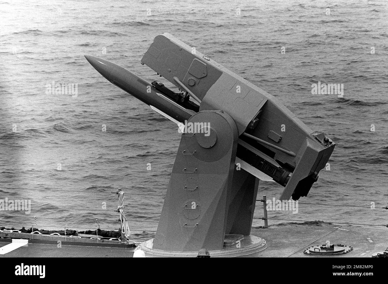 A RIM -66 Standard missile on a Mark 13 Mod 4 launched aboard the guided misile frigate USS FLATLEY (FFG-21). Country: Unknown Stock Photo